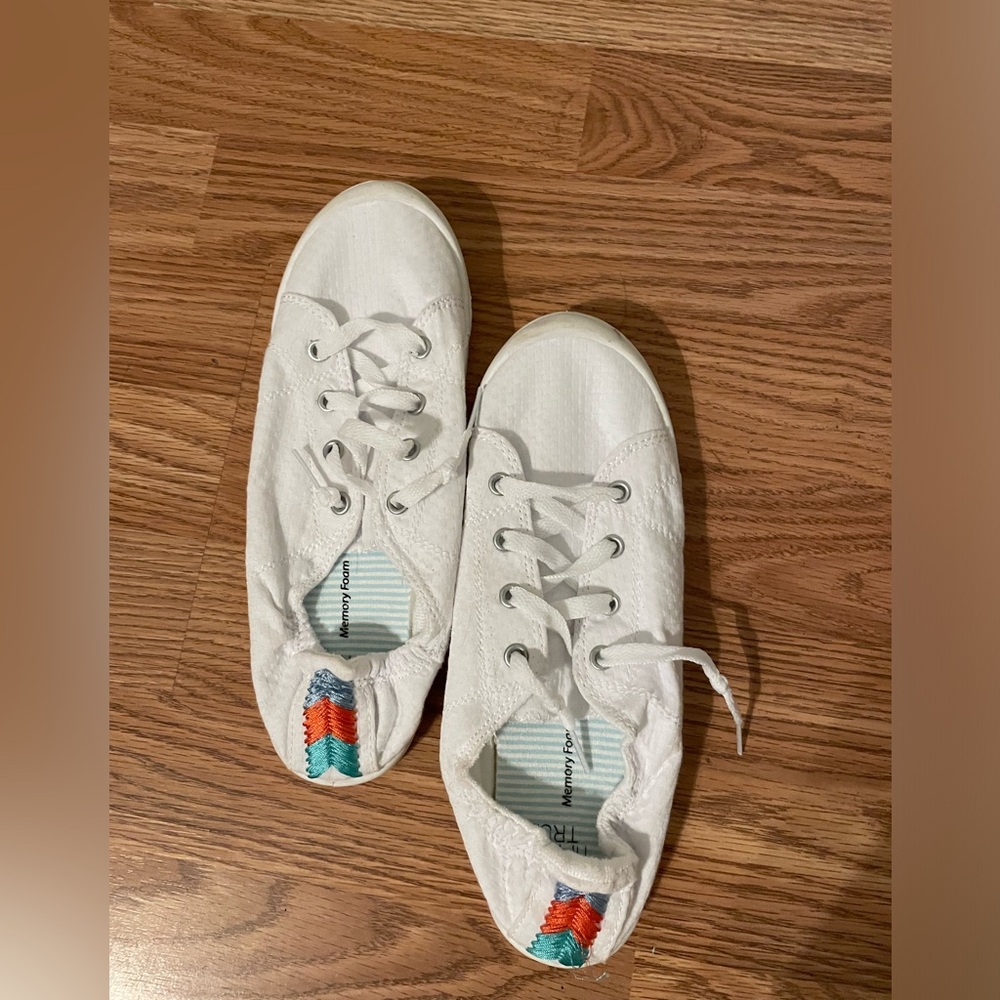 Slip on shows never worn! White with tribal accent